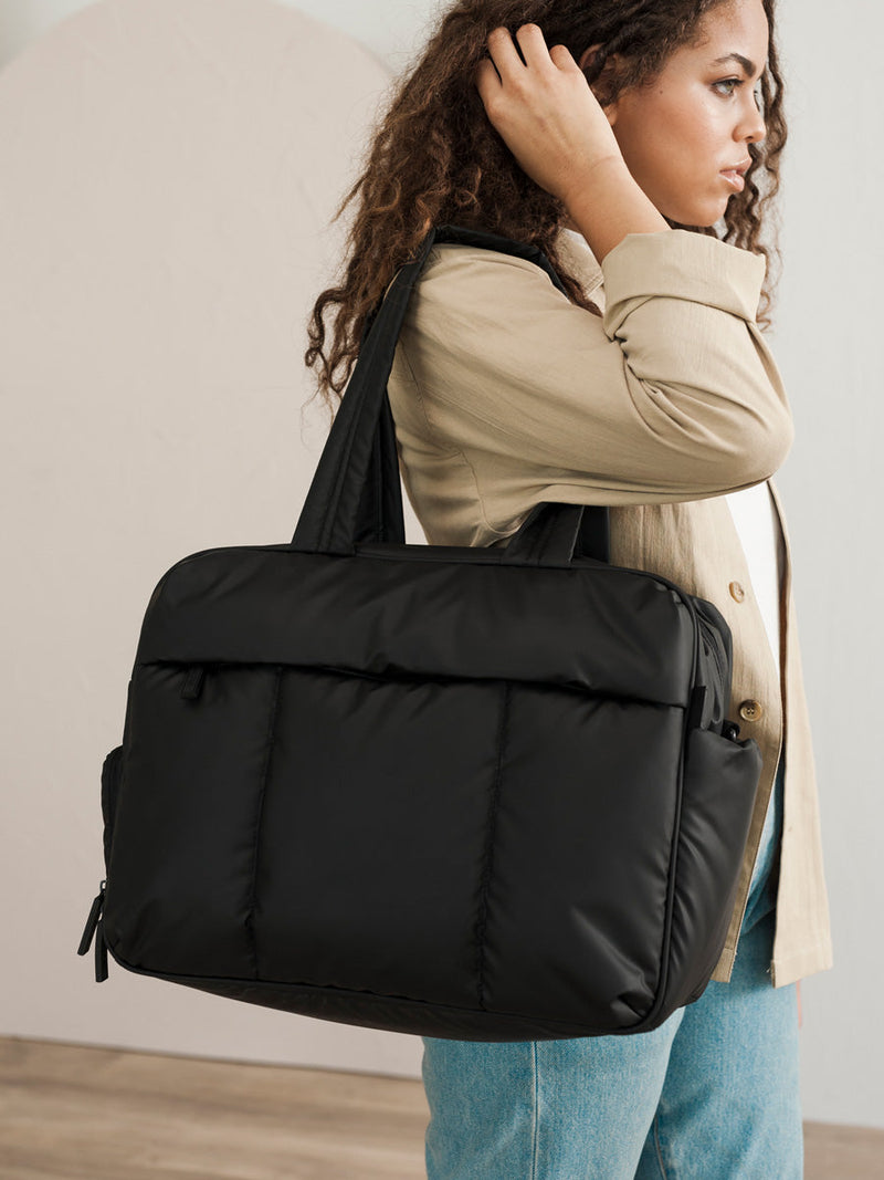 LUKA-MATTE-DUFFEL-BAG-BLACK-LIFESTYLE2_0b0ed2af-c2ca-4a4c-a724-d4dc1cbe19f1.jpg